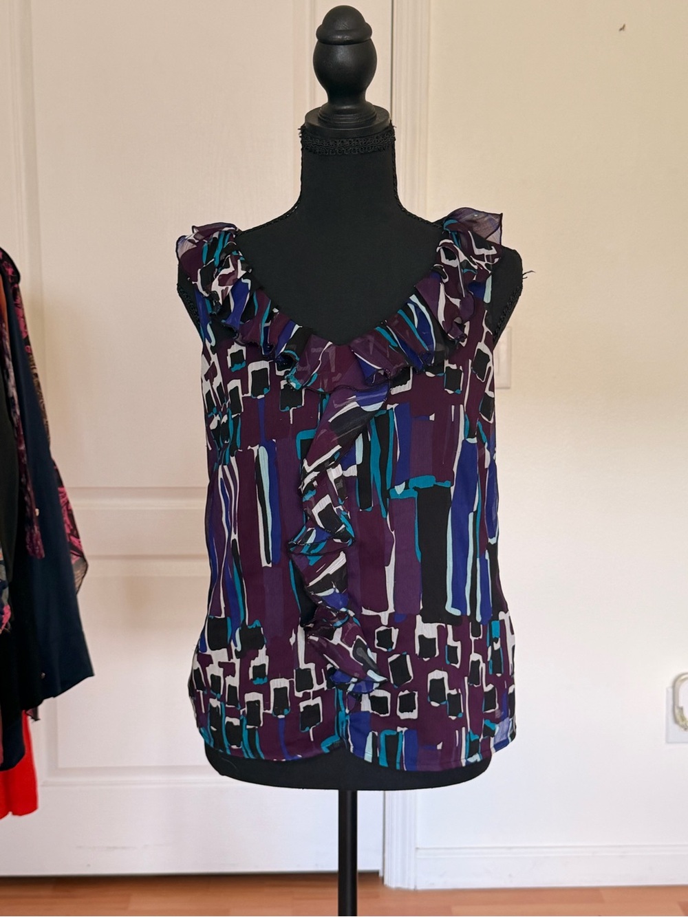 Abstract Geometric Ruffle Neck Sleeveless Blouse